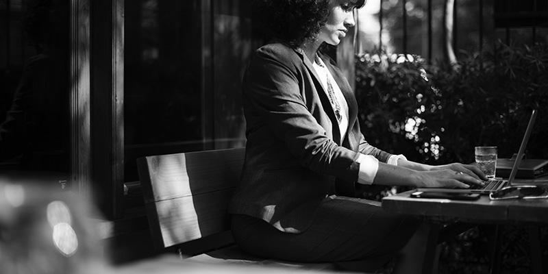 Studious businesswoman working on a laptop